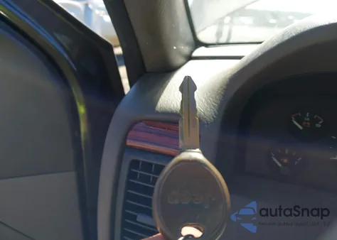 1999 Jeep Grand Cherokee Limited from USA, damaged, VIN 1J4GW68N9XC722800